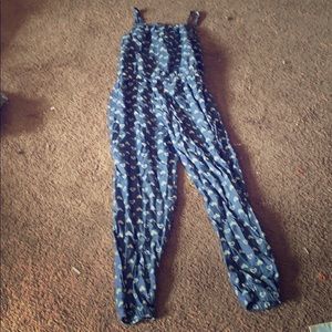 A blue Romper with white hearts
